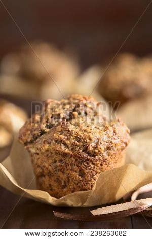 Fresh Homemade Oatmeal Banana And Walnut Muffin, Photographed With Natural Light (very Shallow Depth
