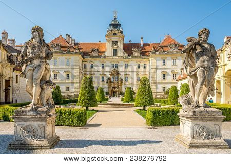 Valtice, Czech Republic - April 19,2018 - View At The Valtice Castle With Statues. The Town Valtice 