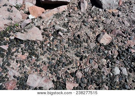 Made From Pebble Gravel Stones Different Shape As Floor Texture Background. Small Rocks Background T