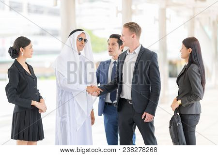 Confident Business People Are Shaking Hands After Agreeing To A Successful Job. Confident And Active