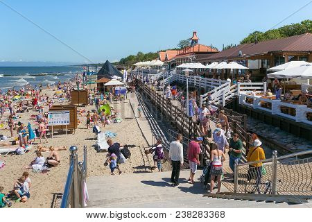 Zelenogradsk, Kaliningrad Region, Russia - July 29, 2017: Unknown People Resting On A Sandy Beach On
