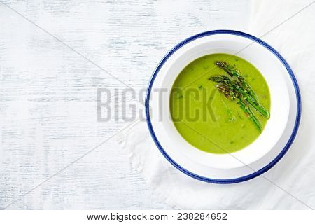 Cream of Green Asparagus and Broccoli Soup with Herbs