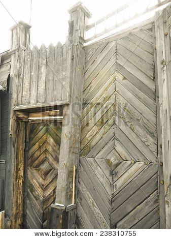 Photo  Abandoned Old House In Russian Village . Vintage Folk Background.