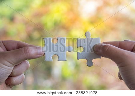 Human Hand Holding Jigsaw Puzzle Business Connection, Business Concepts