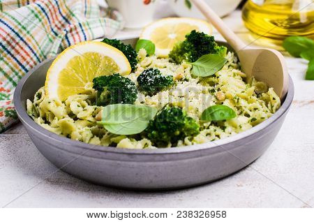 Traditional Pasta Tripoline With Pesto And Broccoli In A Plate On The Table. Selective Focus.