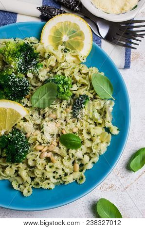 Traditional Pasta Tripoline With Pesto And Broccoli In A Plate On The Table. Selective Focus.