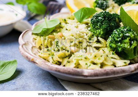Traditional Pasta Tripoline With Pesto And Broccoli In A Plate On The Table. Selective Focus.