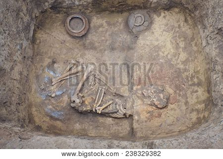 Archaeological Excavations. Research On Human Burial, Skeleton, Skull, Ritual Pot