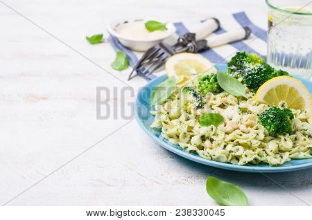 Traditional Pasta Tripoline With Pesto And Broccoli In A Plate On The Table. Selective Focus.