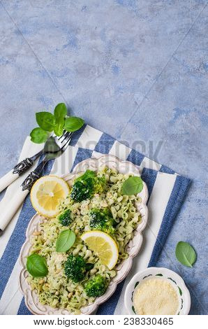 Traditional Pasta Tripoline With Pesto And Broccoli In A Plate On The Table. Selective Focus.