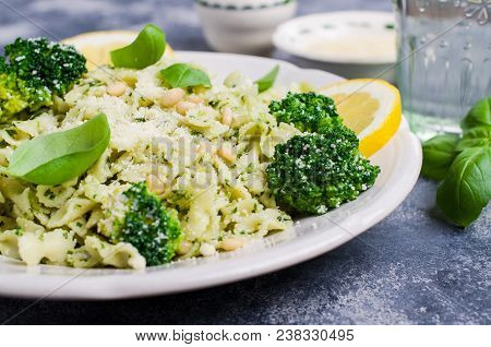 Traditional Pasta Tripoline With Pesto And Broccoli In A Plate On The Table. Selective Focus.