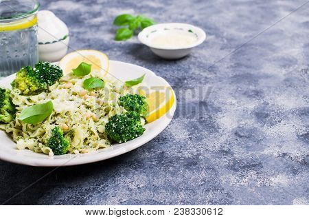 Traditional Pasta Tripoline With Pesto And Broccoli In A Plate On The Table. Selective Focus.