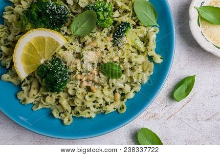 Traditional Pasta Tripoline With Pesto And Broccoli In A Plate On The Table. Selective Focus.