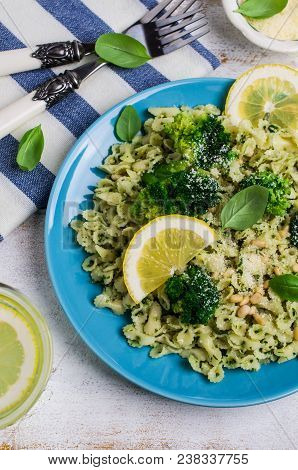 Traditional Pasta Tripoline With Pesto And Broccoli In A Plate On The Table. Selective Focus.