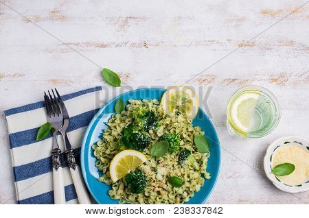 Traditional Pasta Tripoline With Pesto And Broccoli In A Plate On The Table. Selective Focus.