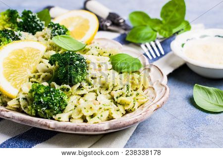 Traditional Pasta Tripoline With Pesto And Broccoli In A Plate On The Table. Selective Focus.
