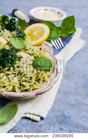 Traditional Pasta Tripoline With Pesto And Broccoli In A Plate On The Table. Selective Focus.