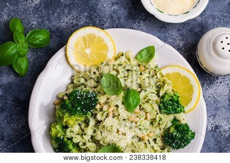 Traditional Pasta Tripoline With Pesto And Broccoli In A Plate On The Table. Selective Focus.