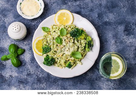 Traditional Pasta Tripoline With Pesto And Broccoli In A Plate On The Table. Selective Focus.