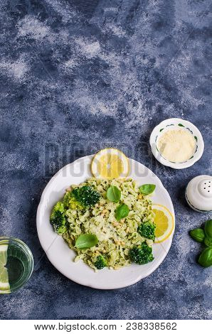 Traditional Pasta Tripoline With Pesto And Broccoli In A Plate On The Table. Selective Focus.