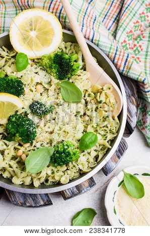 Traditional Pasta Tripoline With Pesto And Broccoli In A Plate On The Table. Selective Focus.