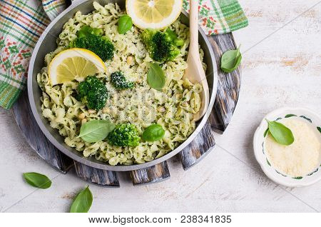 Traditional Pasta Tripoline With Pesto And Broccoli In A Plate On The Table. Selective Focus.