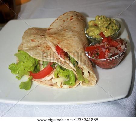 Chicken Tacos With Salsa And Guacamole On The Side