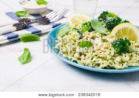 Traditional Pasta Tripoline With Pesto And Broccoli In A Plate On The Table. Selective Focus.