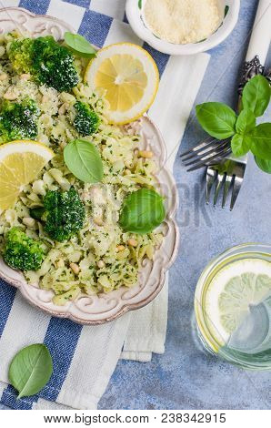 Traditional Pasta Tripoline With Pesto And Broccoli In A Plate On The Table. Selective Focus.