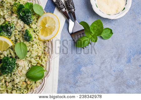 Traditional Pasta Tripoline With Pesto And Broccoli In A Plate On The Table. Selective Focus.