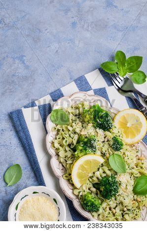 Traditional Pasta Tripoline With Pesto And Broccoli In A Plate On The Table. Selective Focus.