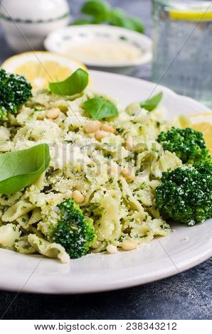 Traditional Pasta Tripoline With Pesto And Broccoli In A Plate On The Table. Selective Focus.