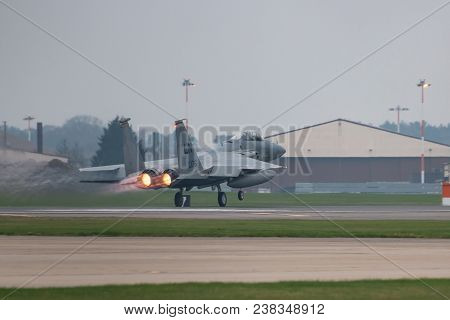 Raf Lakenheath, Uk - April 13, 2018: American Jet F-15 Take Off From Raf Lakenheath Base In A Grey F