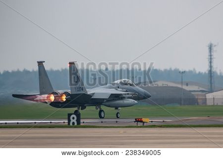 Raf Lakenheath, Uk - April 13, 2018: American Jet F-15 Take Off From Raf Lakenheath Base In A Grey F
