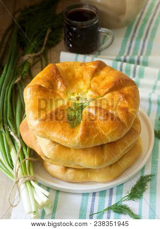 Traditional Homemade Romanian And Moldovan Pies - Placinta, Served With Wine. Rustic Style, Selectiv