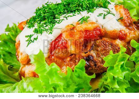 Armenian Kyufta Baked With Cheese And Tomato Sauce