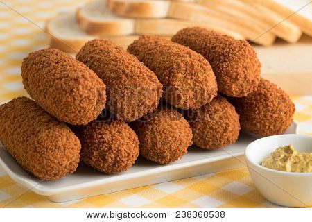 Deep fried Dutch kroketten and mustard for lunch
