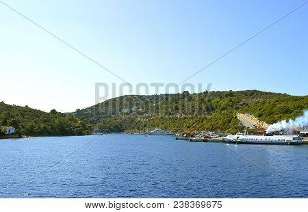 Antipaxos, Greece - October 01, 2017 : Tourist Cruise Ships In Antipaxos Harbour Ready To Sail To Co