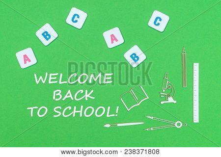 Concept School, Text Welcome Back To School, School Supplies Wooden Minitures, Abc Letters On Green 
