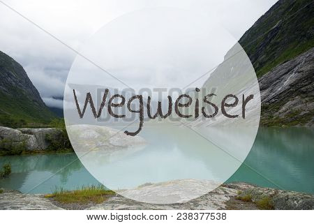 German Text Wegweiser Means Guidance. Lake With Mountains In Norway. Cloudy Sky. Peaceful Scenery, L