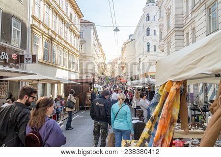 Vienna Austria April 28. 2018, Flea Market In Europe, People Strolling Through Narrow Street