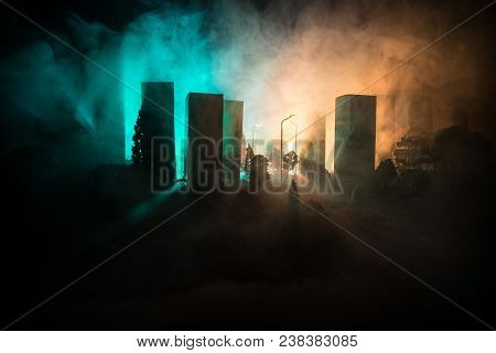 Empty Street Of Burnt Up City, Flames On The Ground And Blasts With Smoke In The Distance. Apocalypt