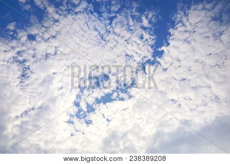 Beautiful Nature Blue Sky With Clouds, Sky Clouds Background, Cloudscape Concept. Space For Text In 