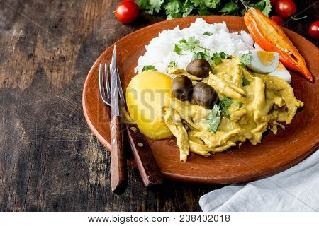 Mexican And Peruvian Cuisine. Aji De Gallina. Chicken Aji De Gallina With Olives Egg And Rice On Cla