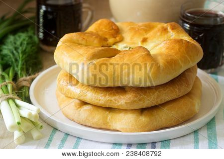 Traditional Homemade Romanian And Moldovan Pies - Placinta, Served With Wine. Rustic Style, Selectiv