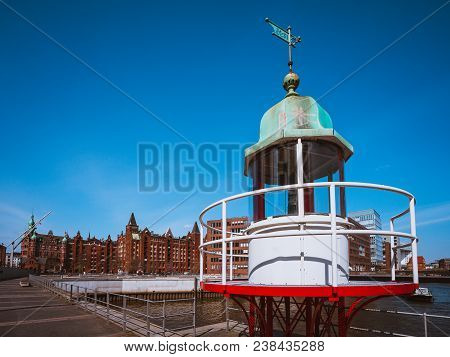 Old Beacon Or Small Lighthouse In Hamburg Hafencity.