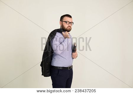 Portrait Of A Man In Business Attire With A Book 1