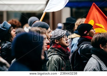 Strasbourg, France  - Mar 22, 2018: French Man With Cigarete Smoking Mdemonstration Protest Against 