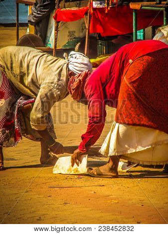 Unknown Woman Cleaning The Street Of Palolem In Goa India October 25-2017 On The Morning