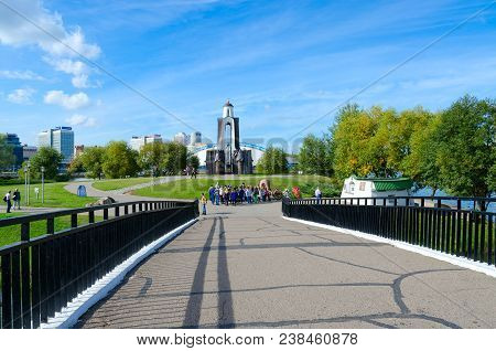 Minsk, Belarus - October 1, 2016: Unknown Tourists Are Near Memorial Complex Monument To Soldiers-in